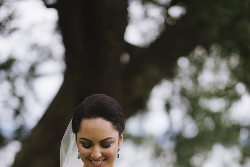 Sleeved dress and bouquet in hand