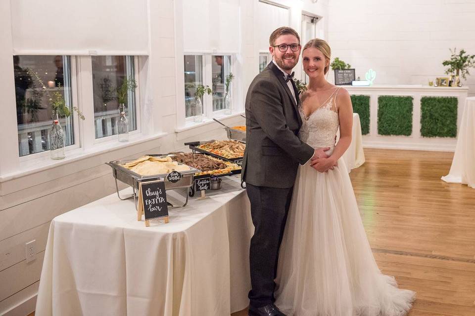 Happy couple and table