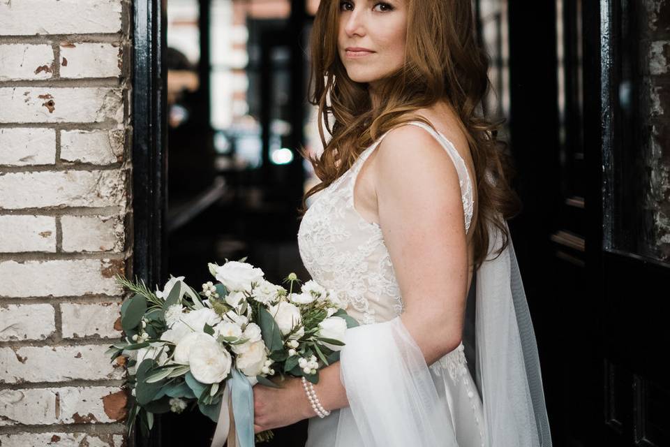 a Bride at her Olympic Rooftop Pavillion wedding at the Ballard Hotel.