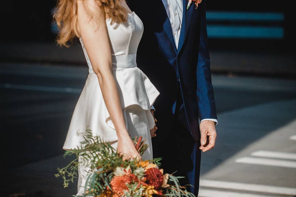 A well dressed couple during their downtown Seattle wedding.