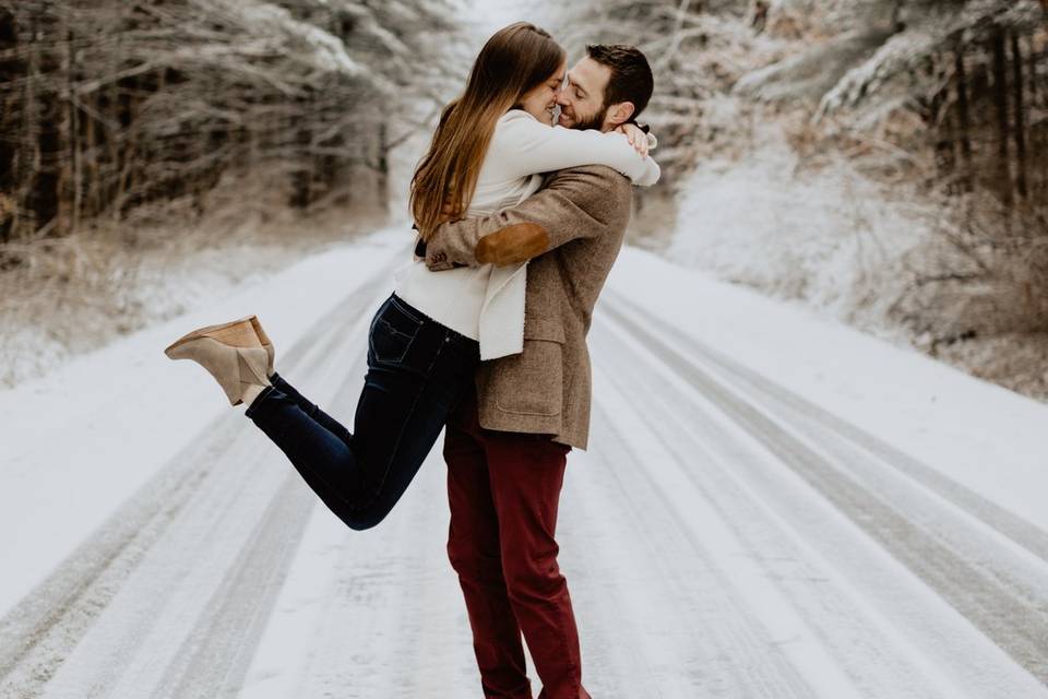 Kissing on a snowy path