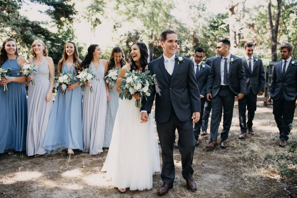 The couple with the bridesmaids and groomsmen