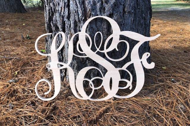 Monogram signs in the woods