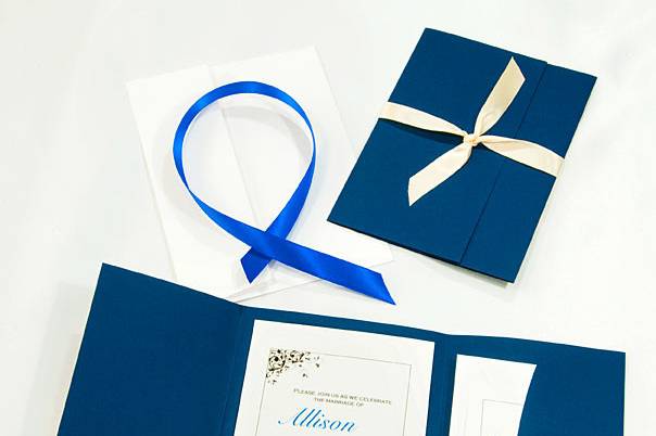 Navy Blue Pocket Folder Kit: Our lovely build your own Pocket Folder kits allow you to customize with different elements. You can have colored inserts that go behind your invitation card, you can accent with ribbons or seals, you can choose from many different templates to easily create the look you want. Unmatched quality, gorgeous invitations.
