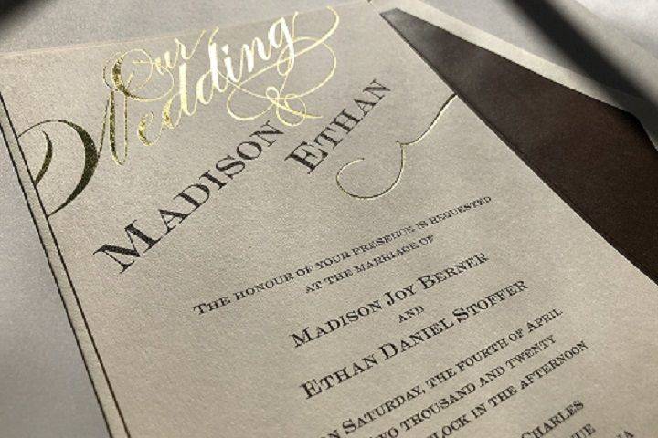 Full color with foil stamped invitation.