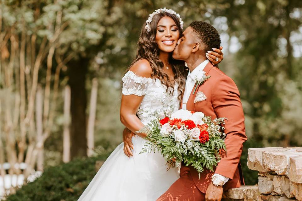 A sweet kiss from the groom.