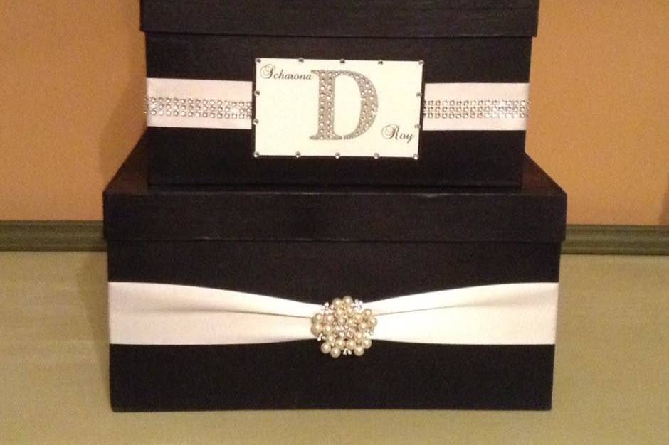 Three tier black and white card box with broach and initial