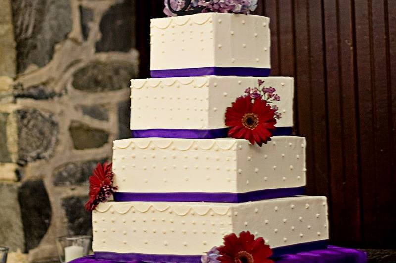 4-tier Offset Square cake in Swiss Meringue Buttercream with Piping, Swiss Dots & Fresh Flowers