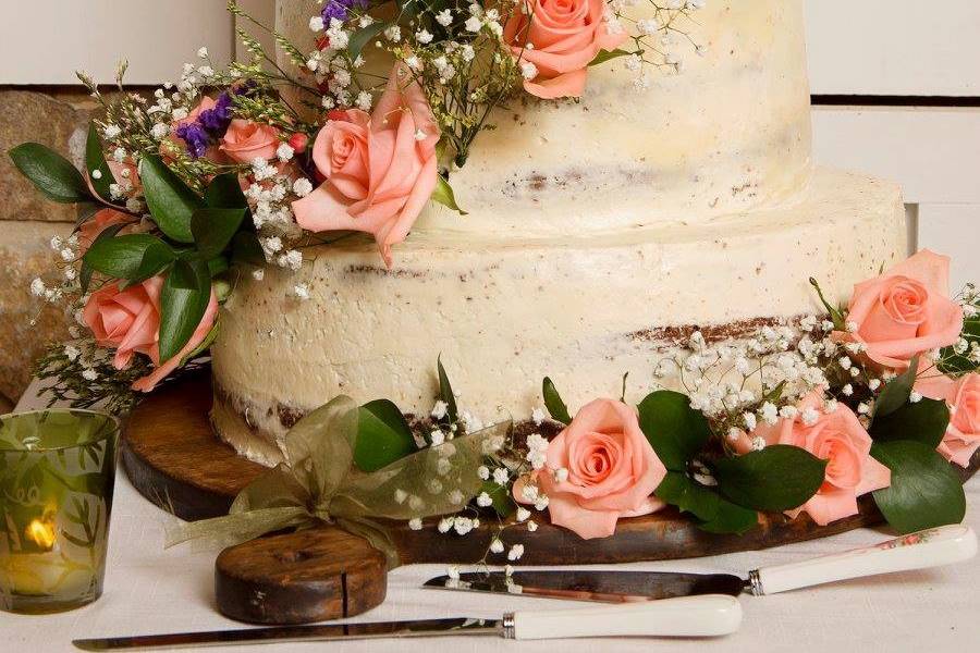 Cascading flowers on a wedding cake