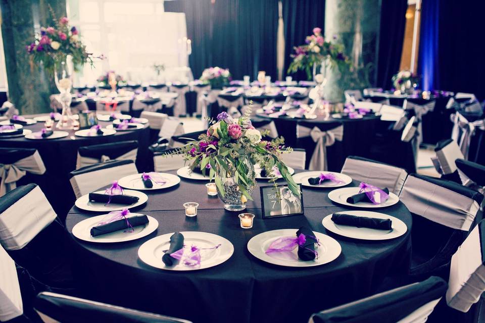Black tables and pink decor