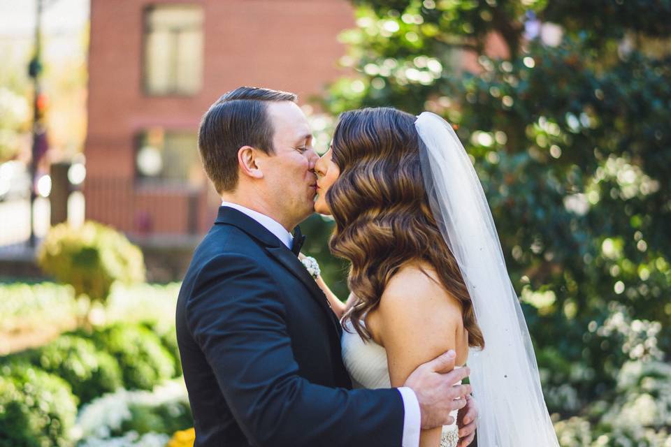 Newlyweds kissing