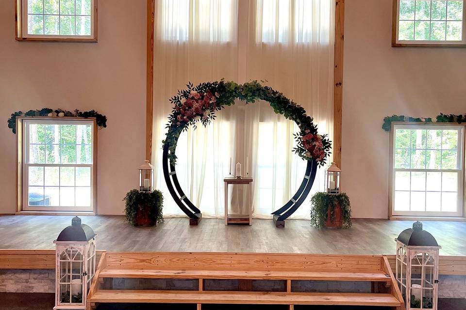 Rounded arch and sheer drapes