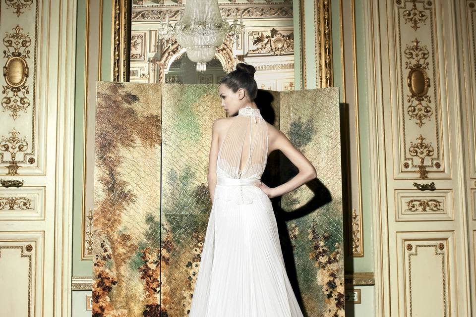 Beautiful sheer bolero jacket with this Yolan Cris gown available at Nouvelle Vogue bridal boutique