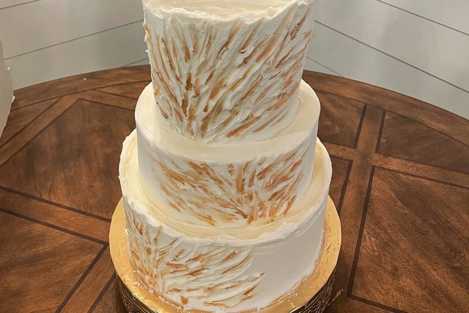 Gold designed bride cake