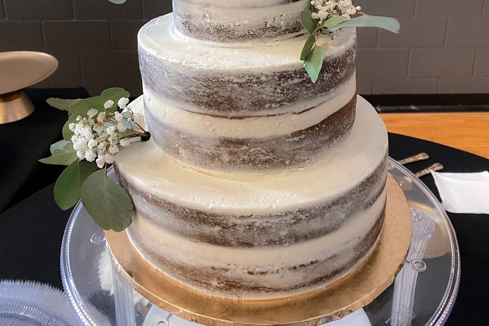 Naked cake with greenery