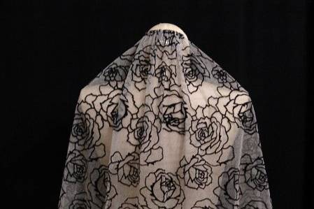 Elbow length veil with outline of roses in Black velvet on White netting