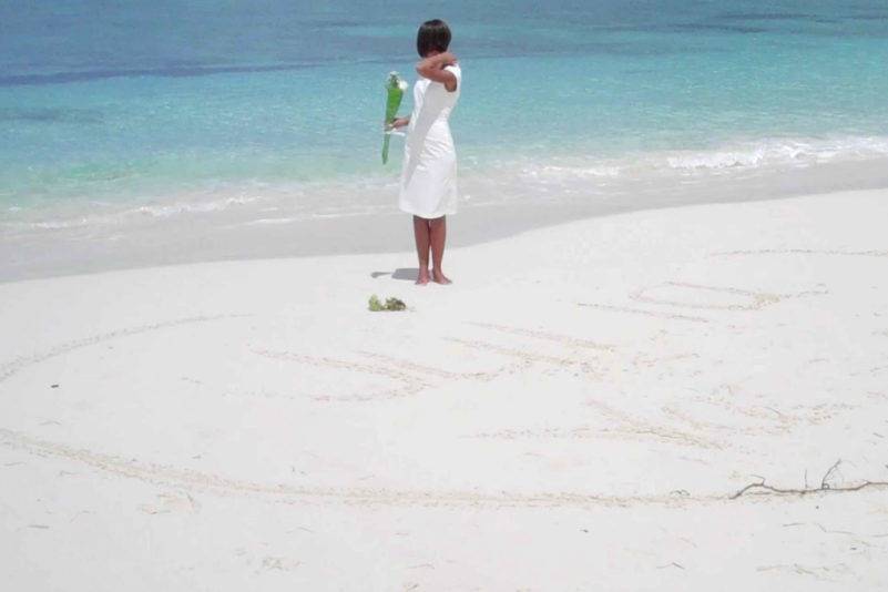 Wedding ceremony with Bahamas wedding officiant Glenn Ferguson on Cabbage Beach Paradise Island Bahamas