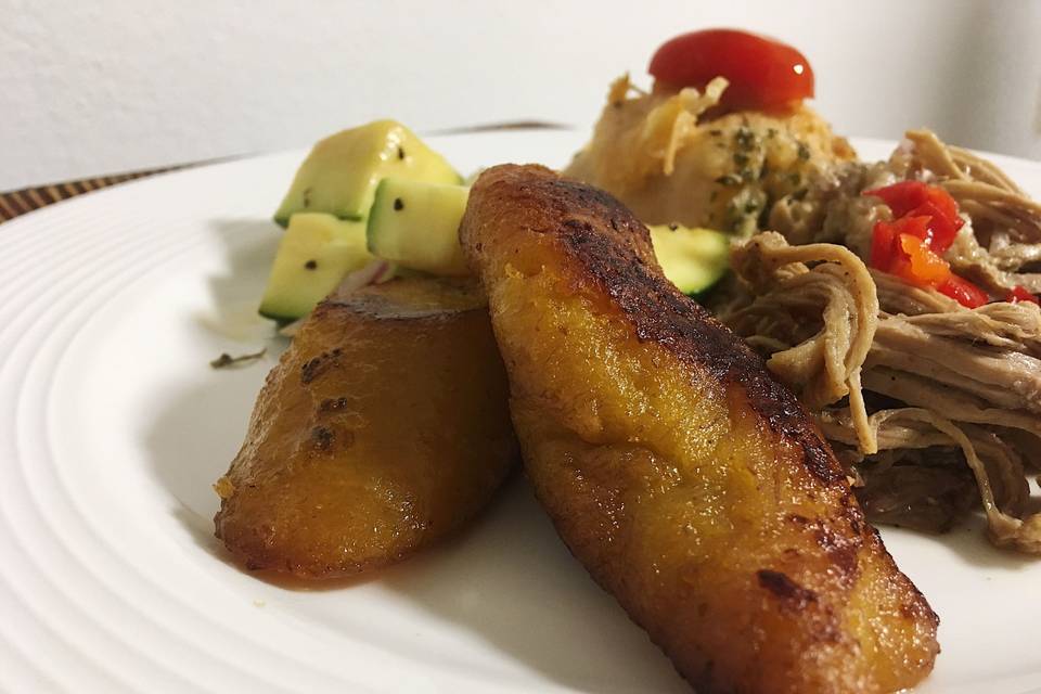 Traditional plantains with roast pork