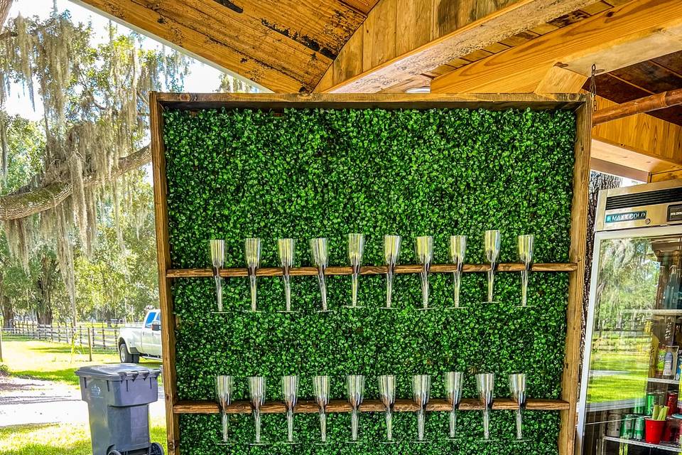 Champagne wall with grass backdrop