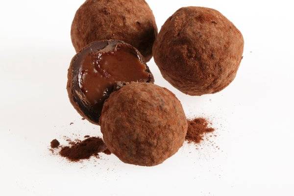 Pure dark chocolate ganache infused with orange zest and Grand Marnier liquor, rolled in cocoa powder.