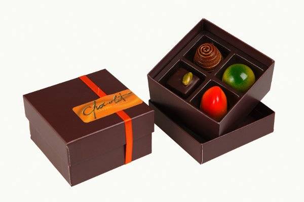 A selection of 4 artisan chocolates from our creations in elegant custom-designed packaging.