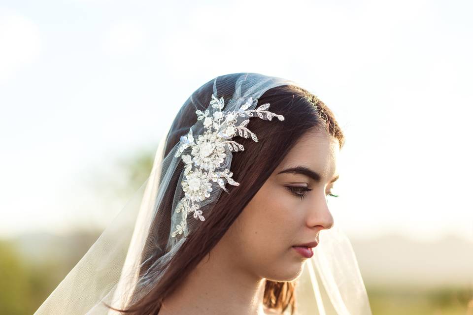 Featured above is Hope Couture Bridals, JEWEL Capl, with raw edge. This veil is cut straight with round edges and is our version of a Juliet Cap with rouching at the top and embroidered lace detail.  The lace detail can be customized.~ the details ~* Length - Chapel 89