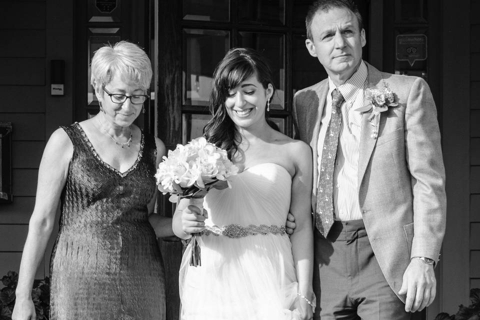 Bride and her parents on our front steps