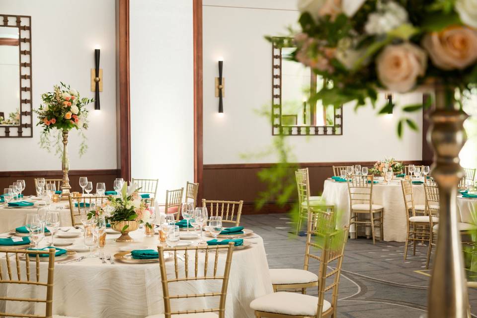 Indoor Reception with Gold Chiavari chairs