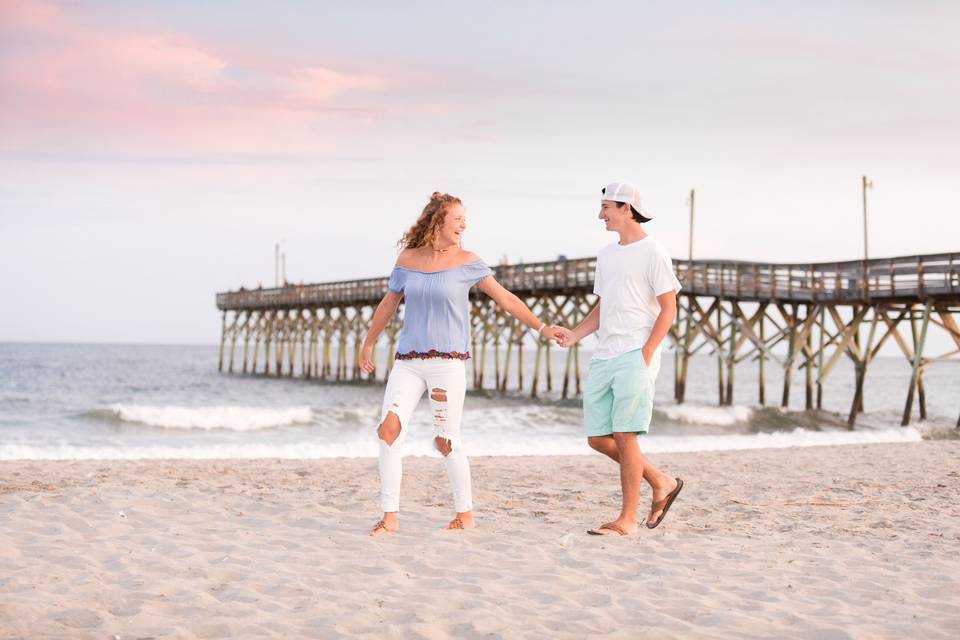 Valerie michelle photography. Baltimore maryland wedding photographer. Engagement photos at sunset on the beach.