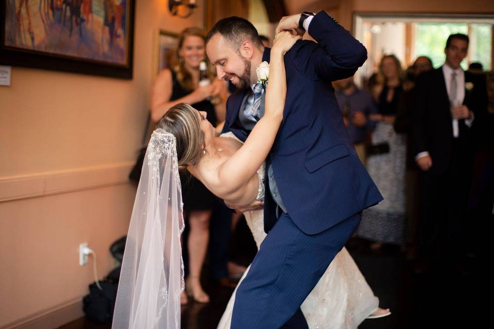 Happy couple dancing to music