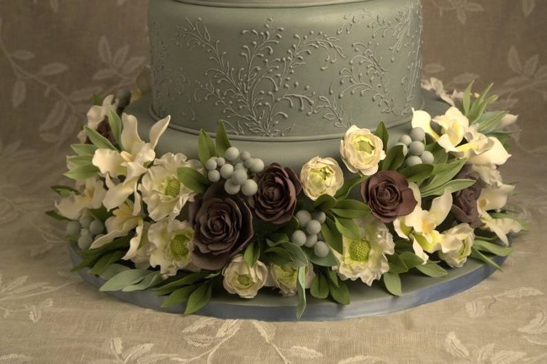 Ana Parzych Custom CakeSlate fondant finished tiers with fine piped scroll detail, gum paste monogram and hand-crafted sugar flowers.