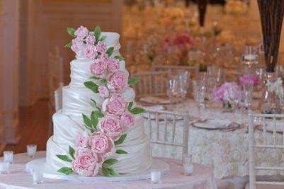 Ana Parzych Custom Cake5-round tiers embellished with fondant drapes painted with silk dust and finished with oversized hand-crafted sugar peonies.