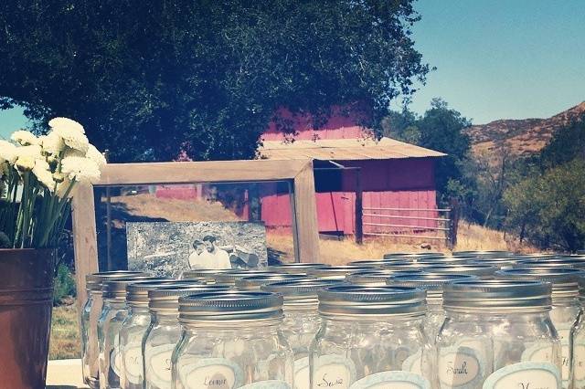 Awesome idea—personalized mason jar favors!