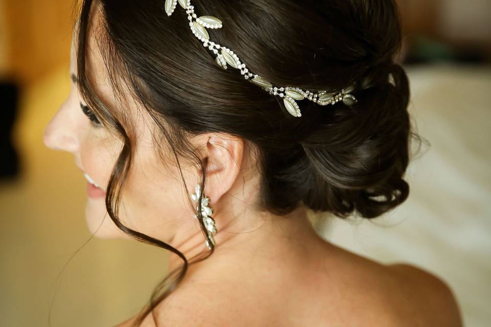 Low bun messy bridal updo