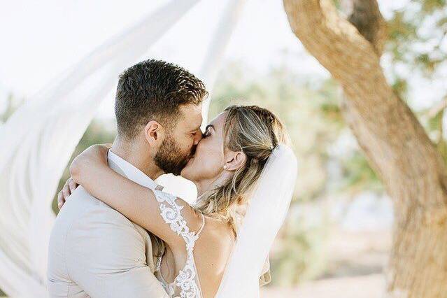 Newlyweds kiss