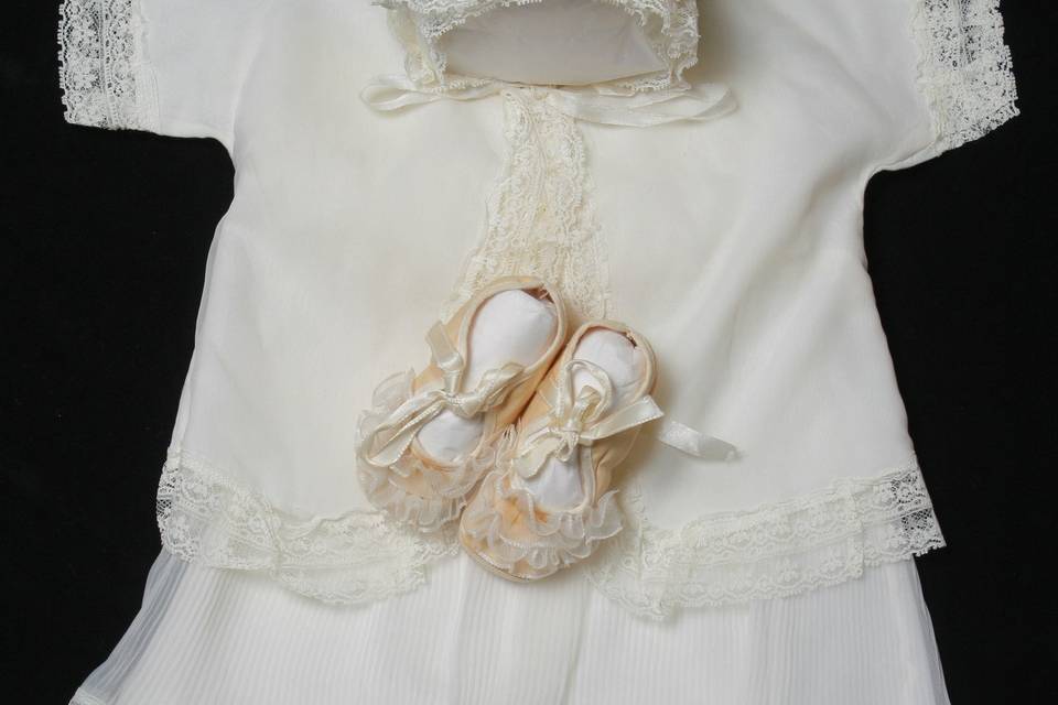 Baby Christening Dress after Restoration by National Gown Cleaners. LLC