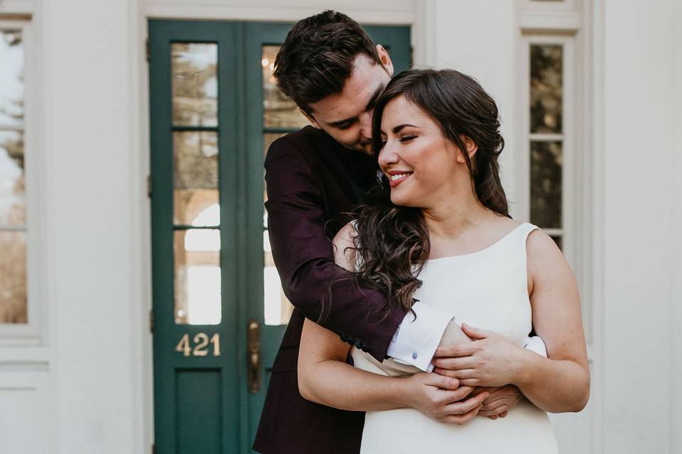 Hugging the bride