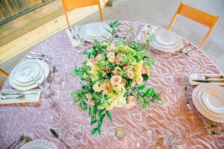 Blush athena tablecloth, hollywood natural folding chairs, and dinnerware