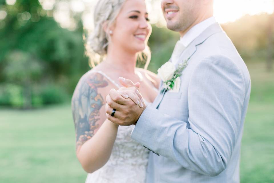 Bride and Groom holding hands