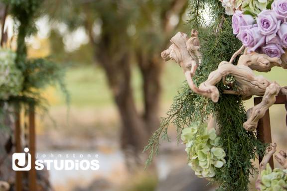 Arch with Pine Garland, Hydrangea and Rose accents
A Floral Affair, Johnstone Studios