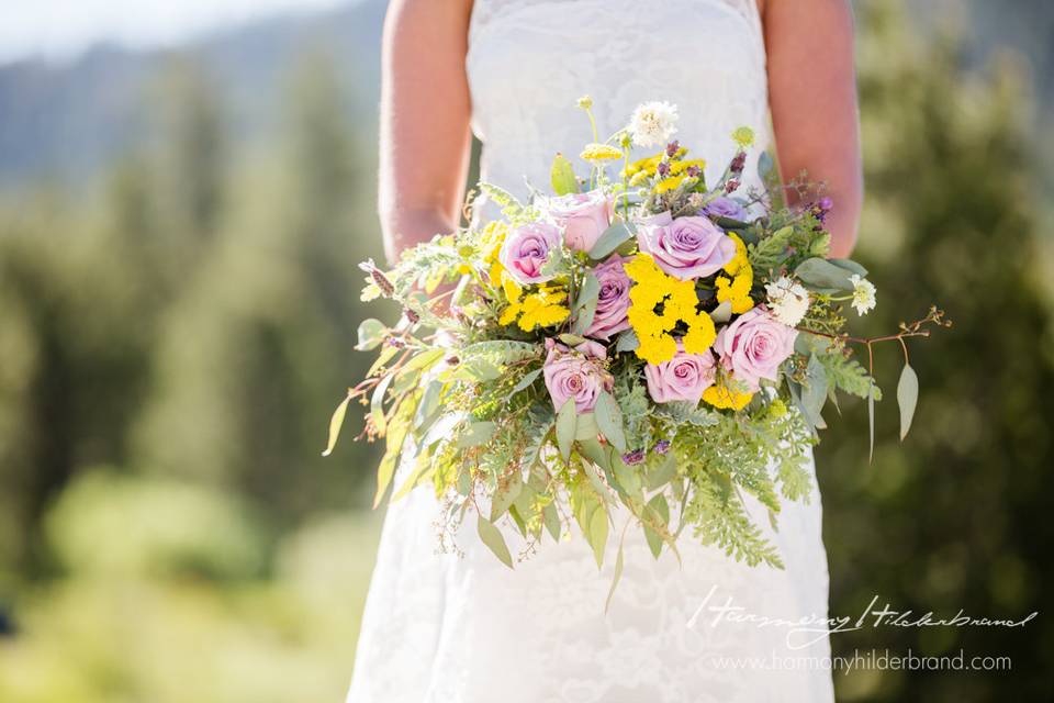 Wildflower Bridal Bouquet
Yarrow, Lavender, Lavender Roses
Floral by A Floral Affair
Photo by Harmony Hilderbrand Photography