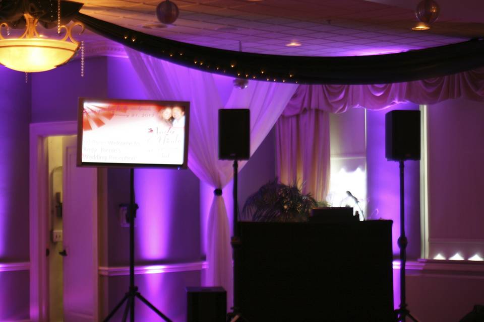 DJ station with purple uplighting
