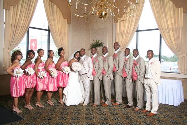 Newlyweds, bridesmaids, and groomsmen