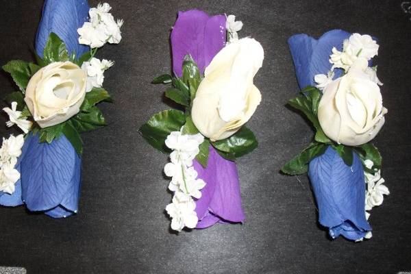 wedding 1/11/2011
Three corsages. Two blue for the mothers, one purple for the friend of the bride.