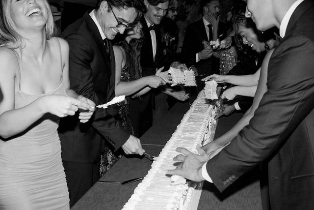 Guests Cut Wedding Cake