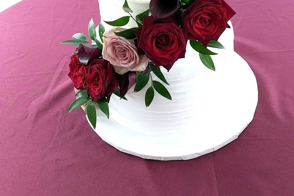 Naked wedding cake with roses