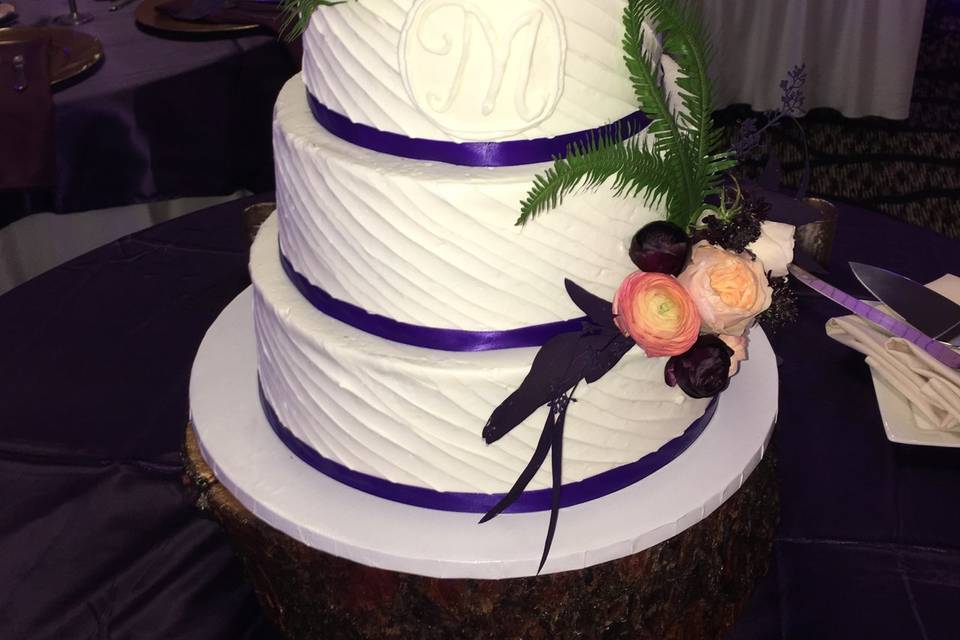 4-tier wedding cake with purple details