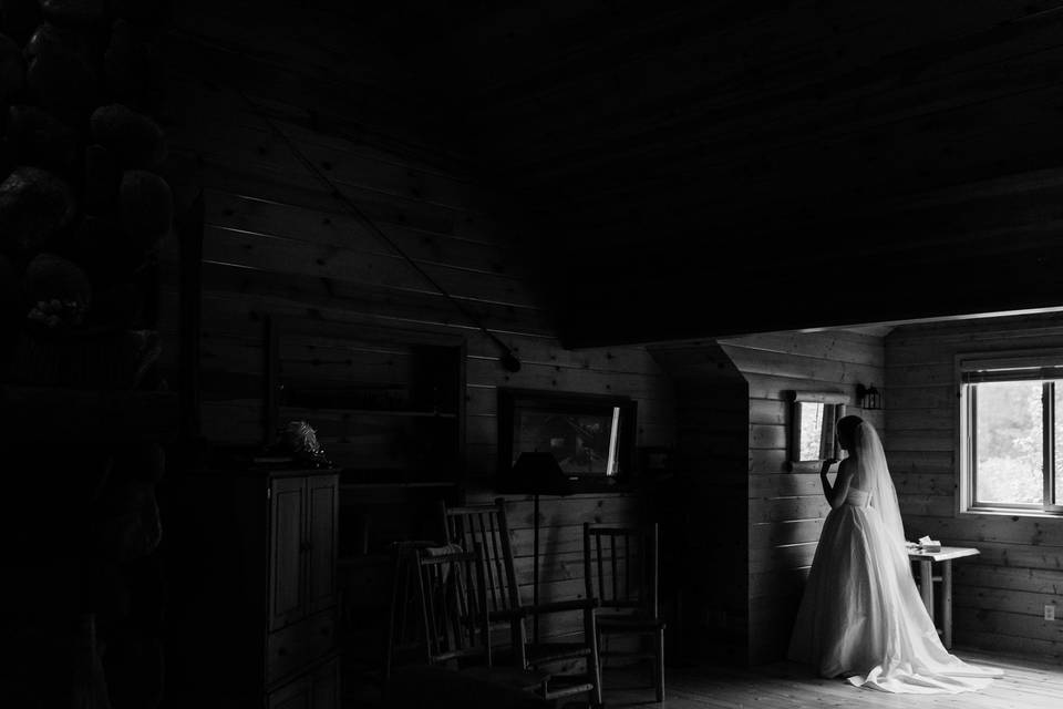 Bride getting ready in a cabin