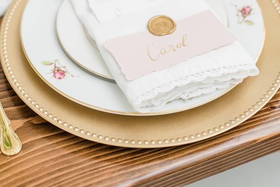 Place setting in gold and blush