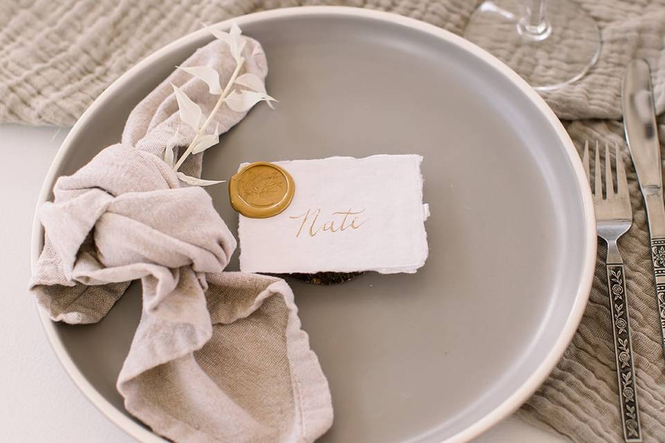 Gray and cream place setting
